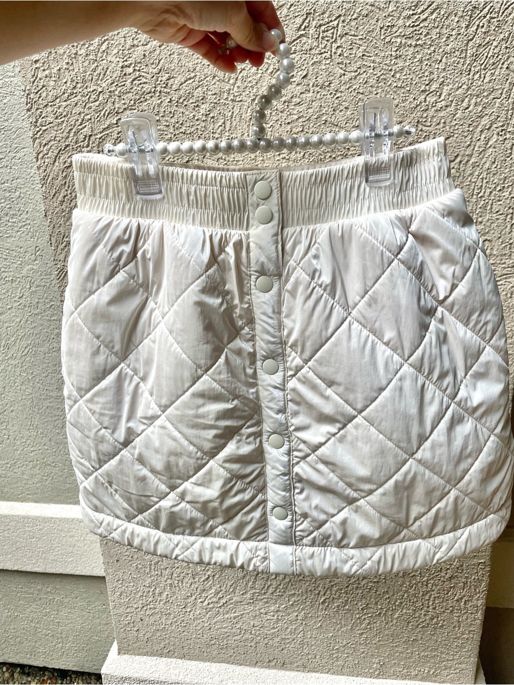 Athleta Girl Quilted Button-Front Mini Skirt in White fits a women’s xs pockets